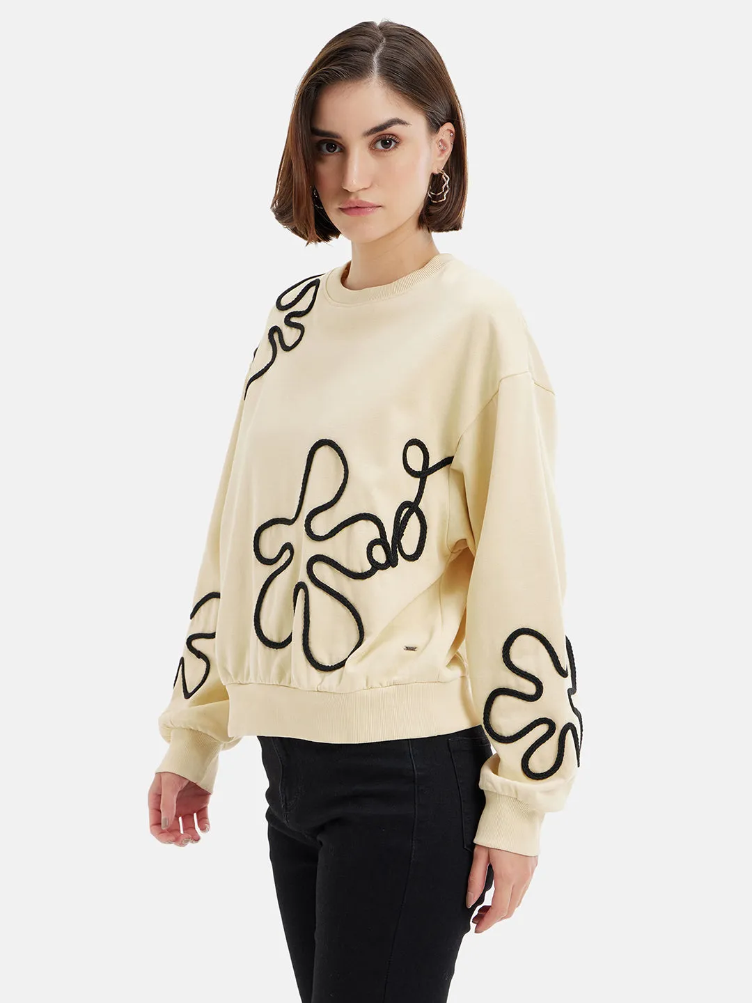 Corded Floral Sweatshirt.